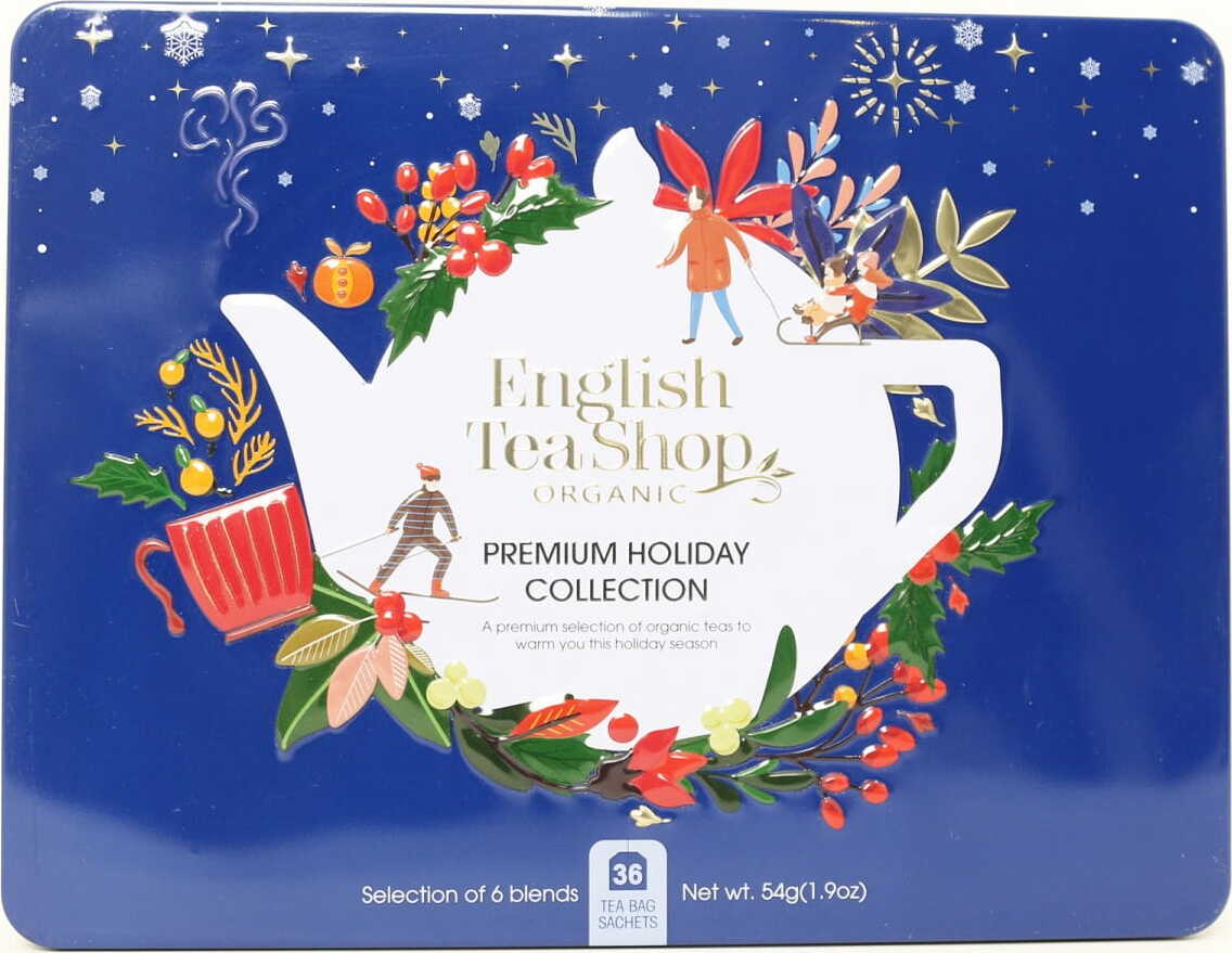 En samling af juleteer i en metalbeholder kobolt 6 smagsvarianter BIO - 36 teposer ENGLISH TEA SHOP